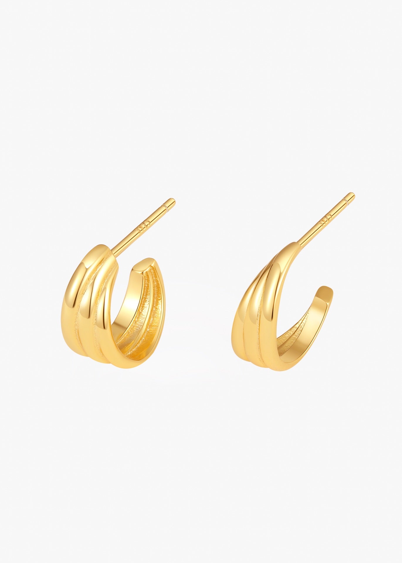Radiant Curve Huggie Earrings