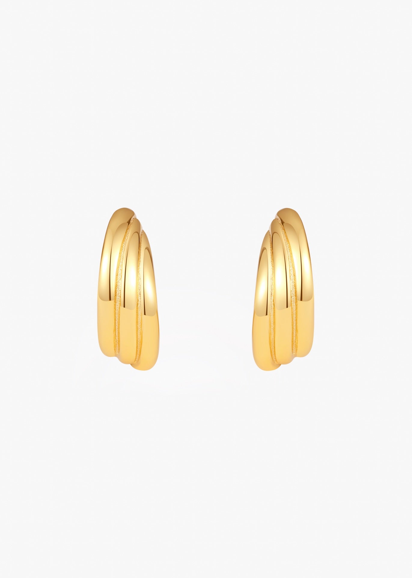 Radiant Curve Huggie Earrings