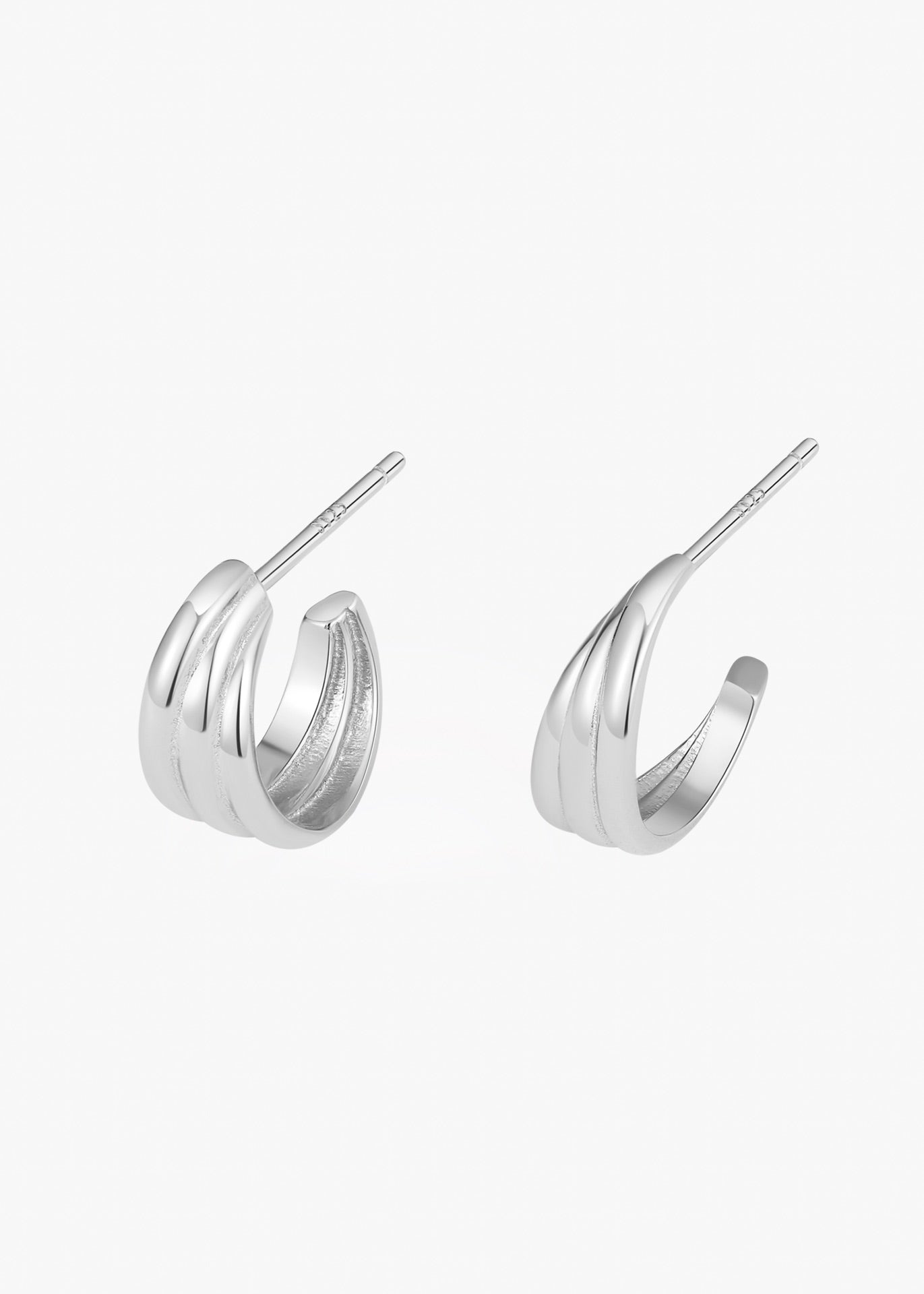 Radiant Curve Huggie Earrings