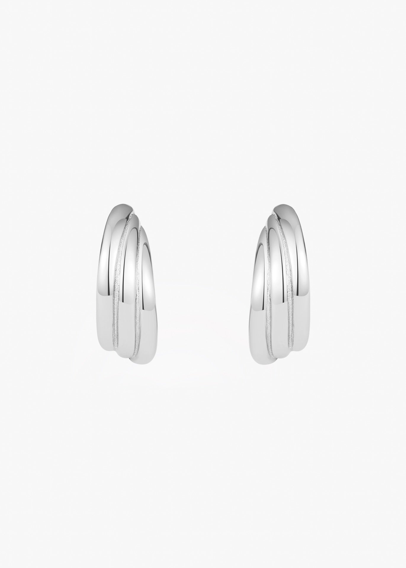 Radiant Curve Huggie Earrings